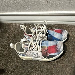 Printed kicks trump shoes